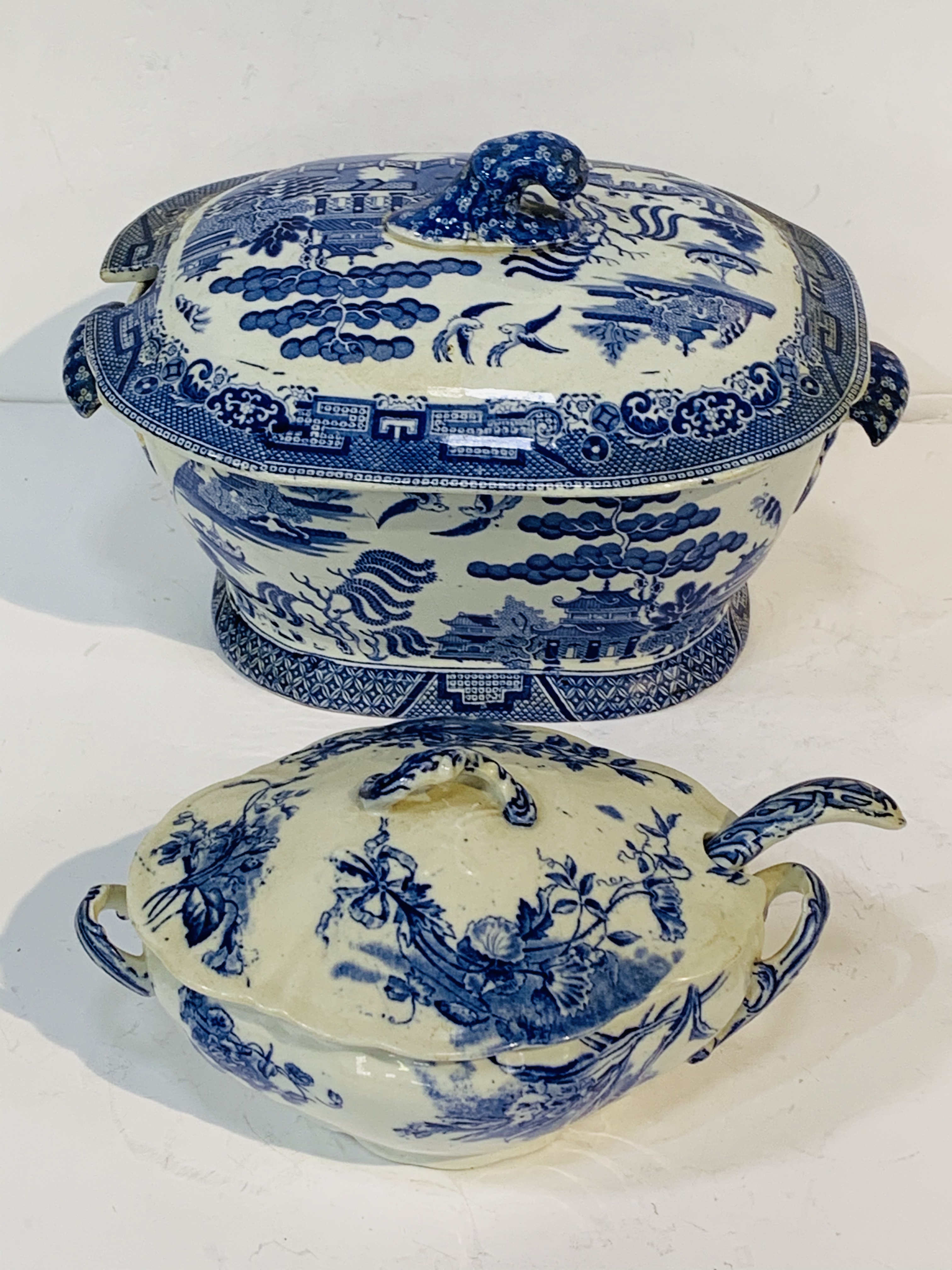 Willow pattern covered tureen; with a blue and white Doulton, Burslem "Sydenham" covered tureen.