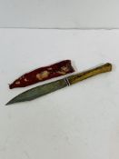 Rare Masai tribal belt knife with skin covered handle.