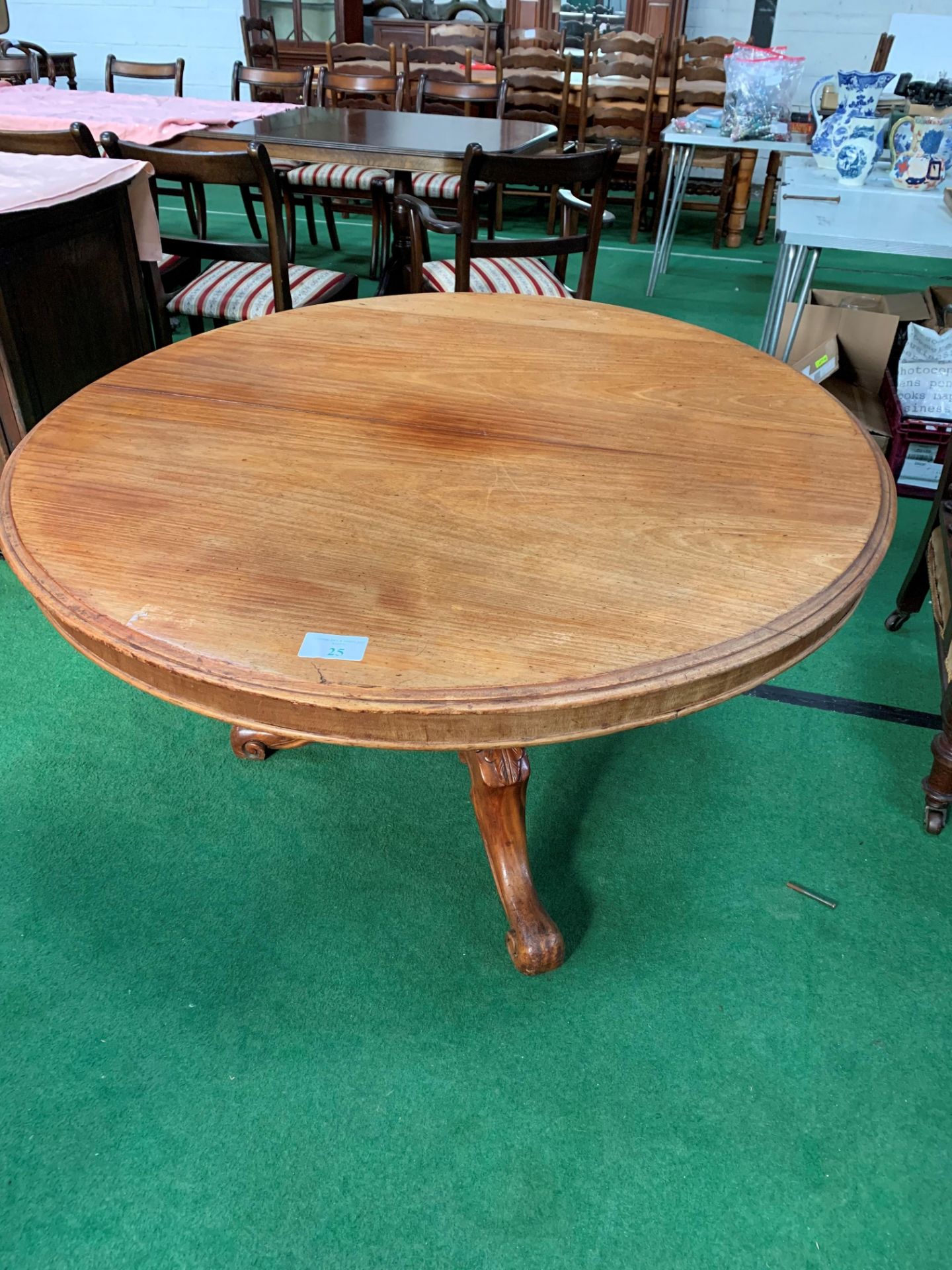 Mahogany circular tilt top table.