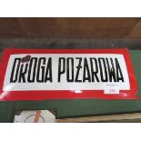 Large domed shape Polish enamel sign. "Fire Escape" in red and white.