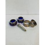 Pair silver napkin rings; 2 silver rimmed cruet pots, and a silver cigarette holder case