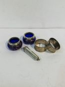 Pair silver napkin rings; 2 silver rimmed cruet pots, and a silver cigarette holder case