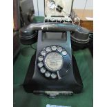 Black bakerlite GPO telephone, model number B32F.