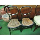 2 ebonised and mother of pearl decorated cane seat bedroom chairs.