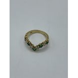 18ct gold diamond and emerald ring size I, weight 2.9gms.