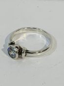 Silver 925 solitaire ring with white stone, in display box.