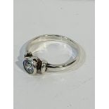 Silver 925 solitaire ring with white stone, in display box.