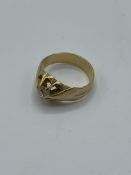 Yellow metal and diamond ring, size J, weight 5.2gms.