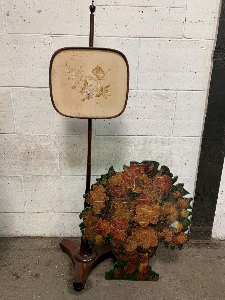 Mahogany turned & embroidered fire screen together with a wooden fire screen in the shape of a tree.