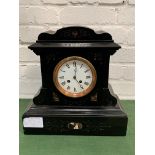 Polished slate mantel clock with marble inserts.