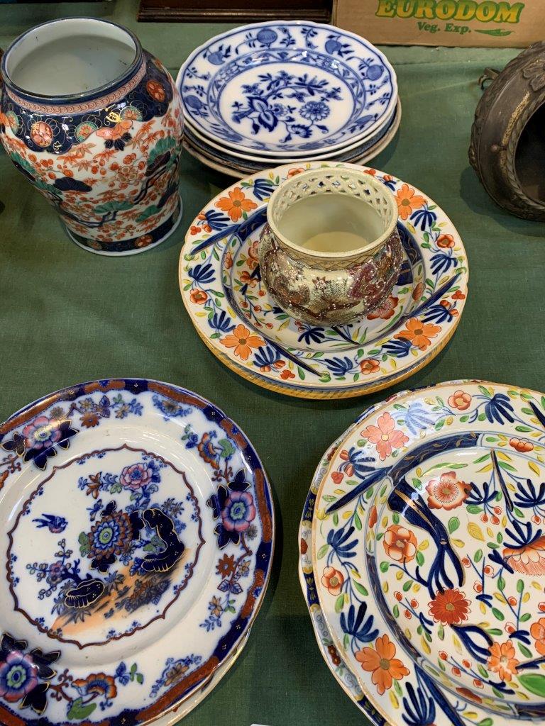 Collection of decorative plates and bowls