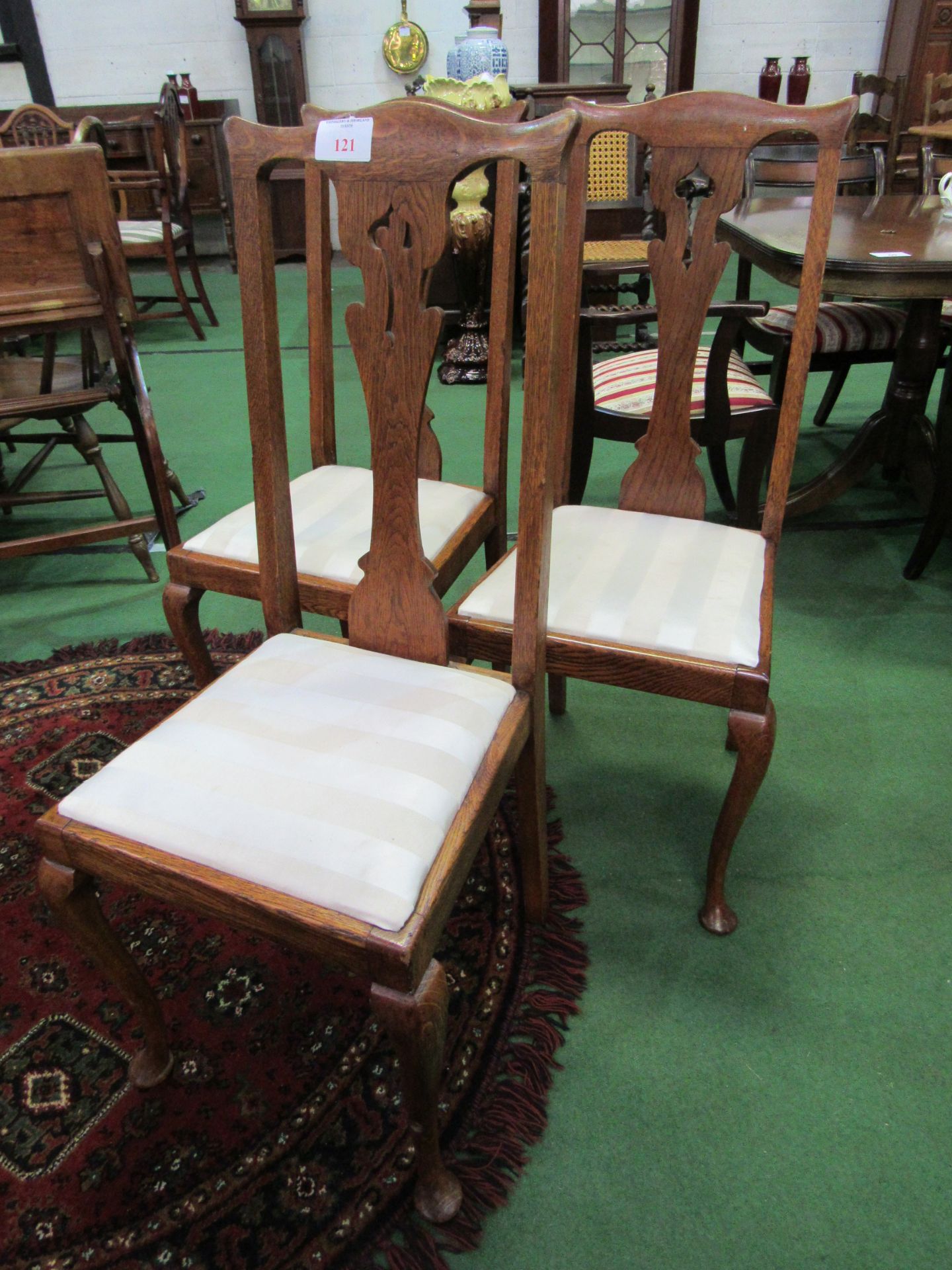 3 oak high back chairs with drop-in seats.