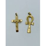 9ct gold crucifix and a yellow metal ankh