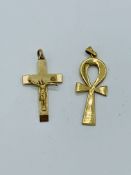 9ct gold crucifix and a yellow metal ankh