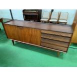 1950s teak sideboard with 2 cupboards and 4 graduated drawers.