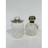 Edwardian cut glass scent bottle with silver lid, together with a glass pot with silver lid