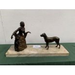 Large Art Deco bronze lady with her dog, mounted on variegated marble base.