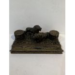 Large Black Forest carved desktop ink stand with Lion mounts and tree stump inkwells.