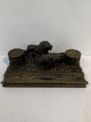 Large Black Forest carved desktop ink stand with Lion mounts and tree stump inkwells.