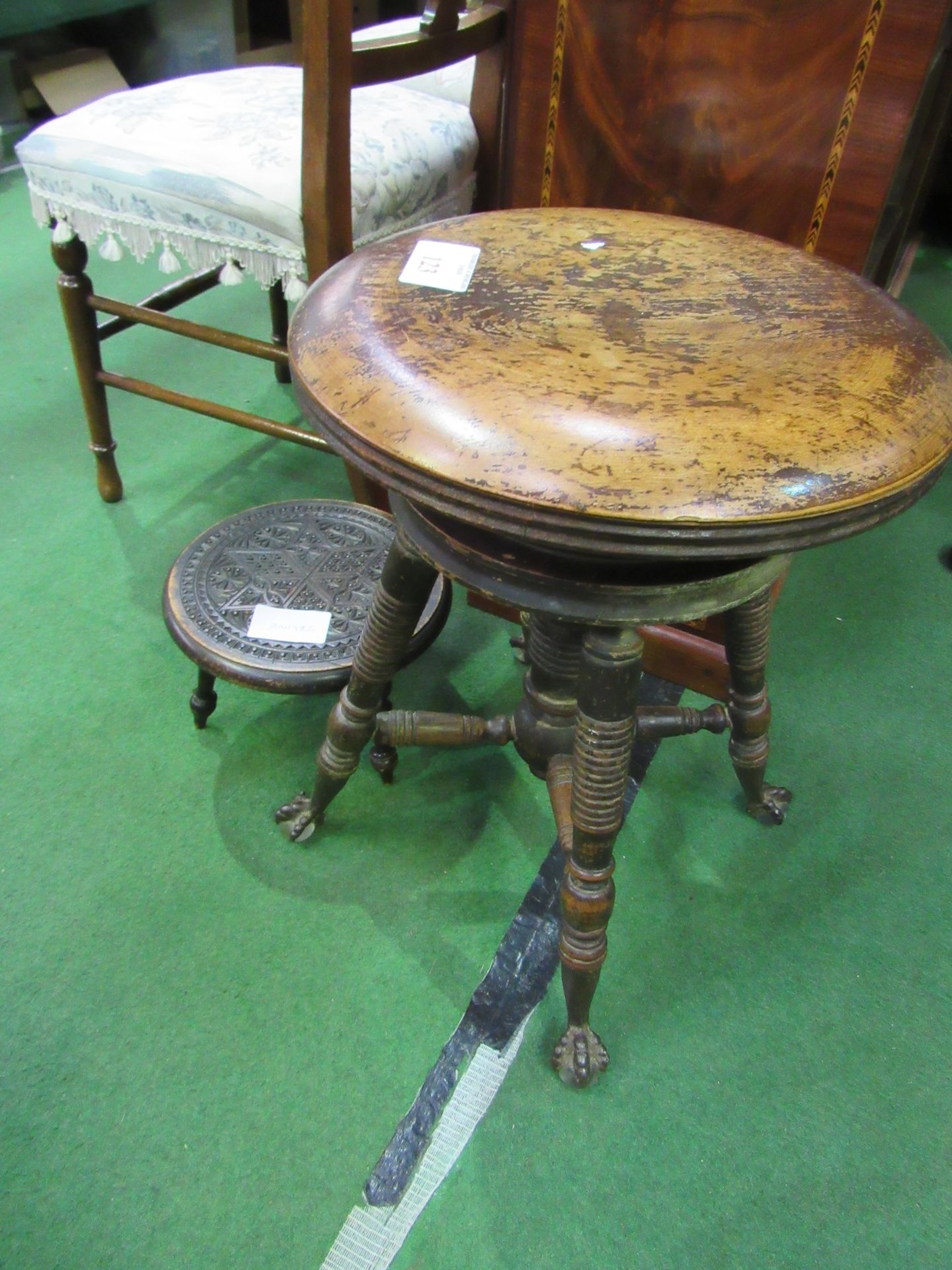 Height adjustable piano stool by Holtzman & Sons (Ohio) together with small carved foot stool.