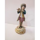 19th Century Meissen figure of a man playing a flute.