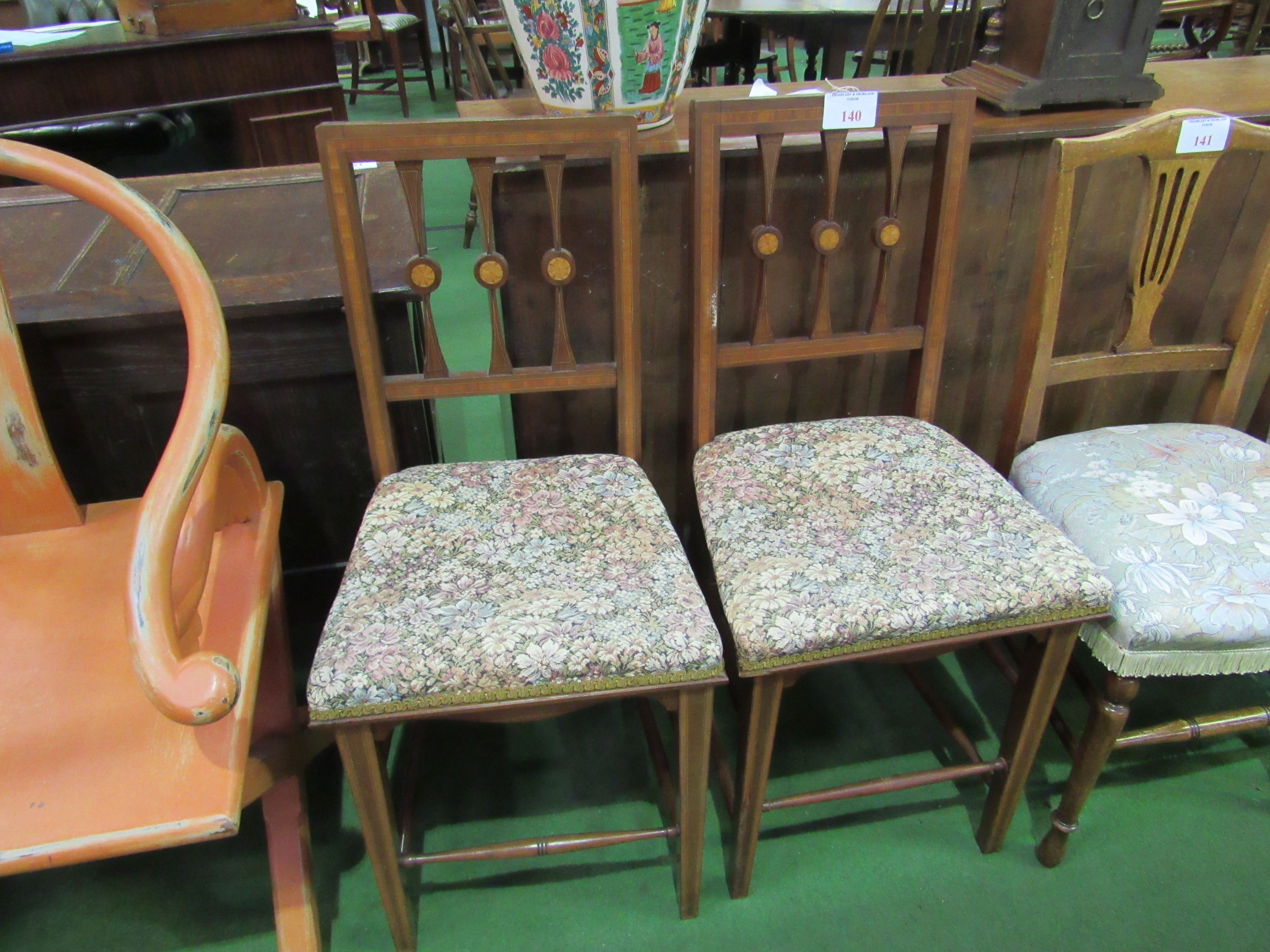 2 inlaid mahogany side chairs.