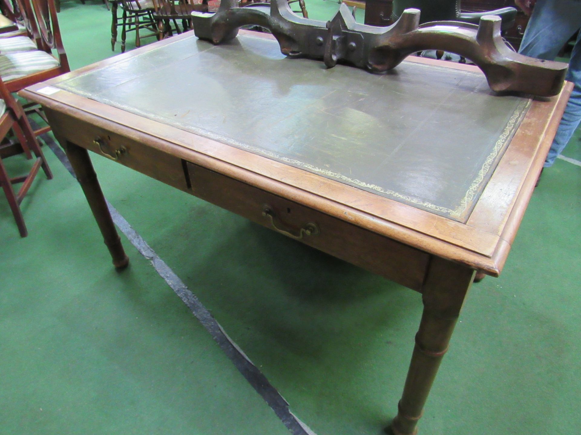 Mahogany writing table with leather skiver and 3 frieze drawers.