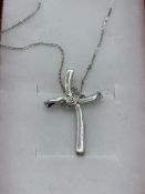 9ct white gold zirconia set cross necklace.