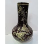 Pair of dark red bottle vases hand-painted with birds and foliage in the style of Thomas Webb