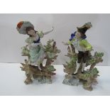 Pair of Scheibe-Alsbach figurines of a girl standing on a bench and boy standing on a bench