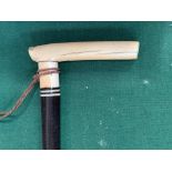 Fine ebony Dandy Stick with ivory handle and ball pomander.