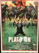 Two framed and glazed film posters, Platoon (1987) and Commando (1985)