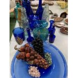 11 pieces of blue glass; 4 glass grape bunches; Art glass blue and yellow vase; 2 vintage lemonade b