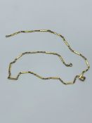 Gold flat bar and knot necklace marked 585