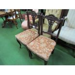 4 Mahogany framed open splat dining chairs.