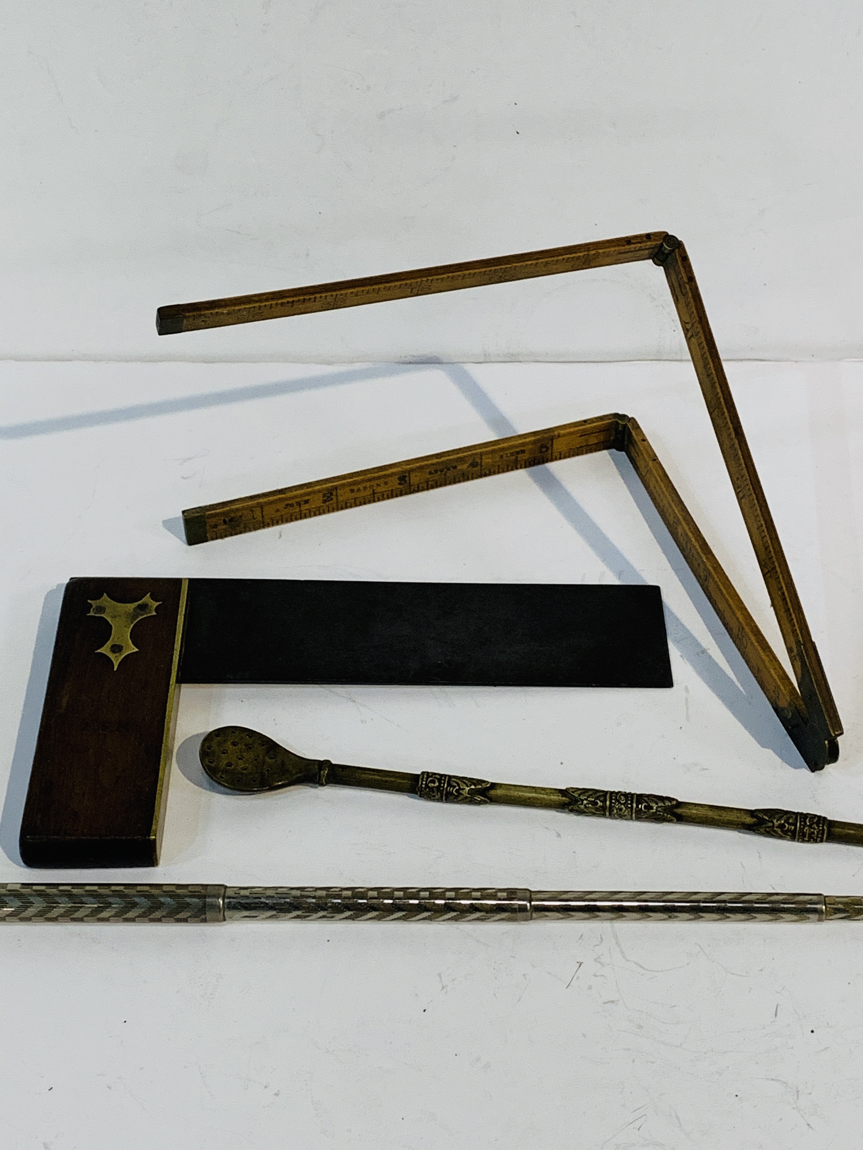 Brass bound right angle set square; boxwood 2 foot rule by Warrand; metal telescopic instrument.