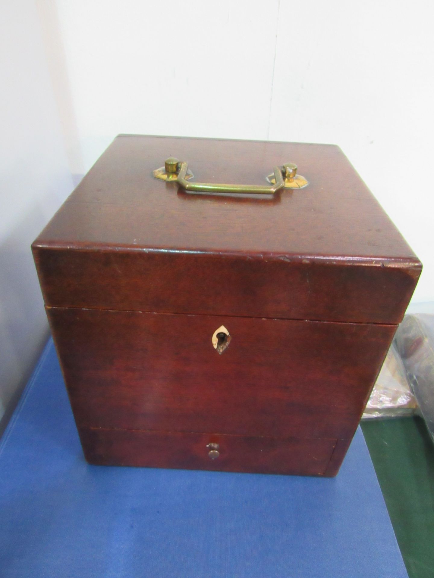 Victorian mahogany apothecary box with many bottles and potions.