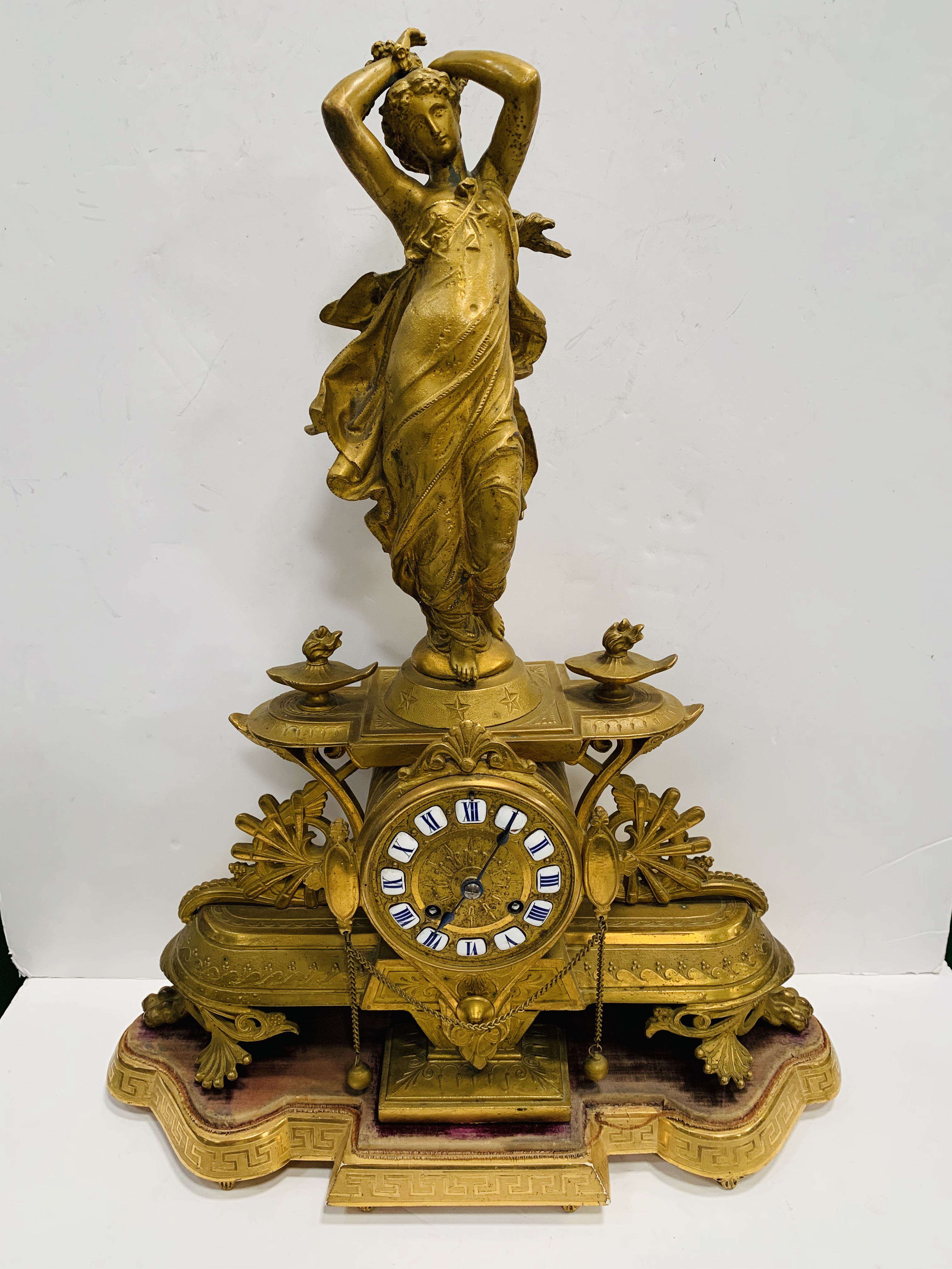 Gilded metal French mantel clock by P H Mourey.