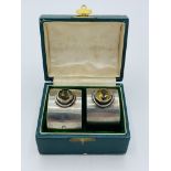 Two Scottish silver napkin rings dated 1900, in original case.
