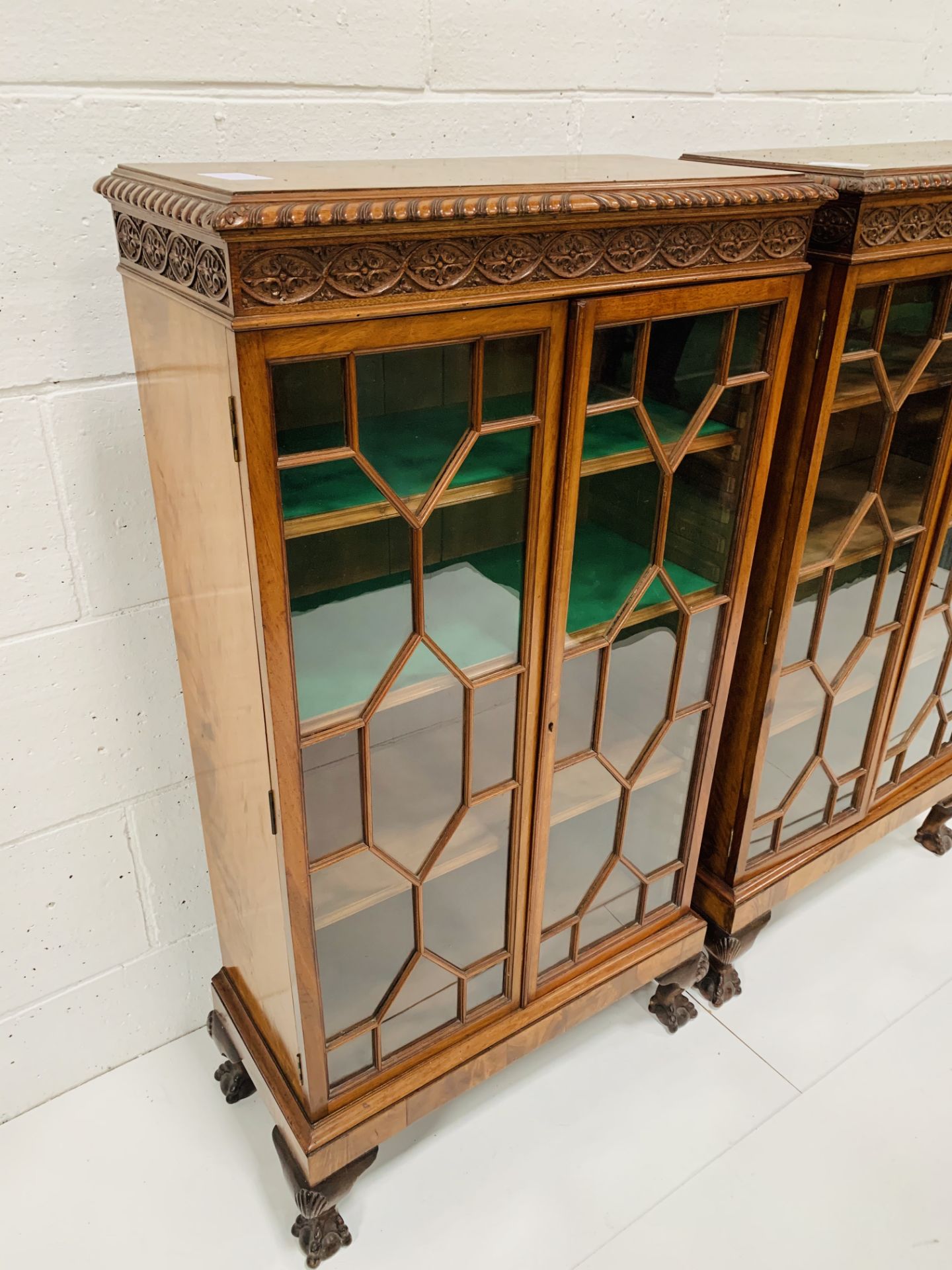 A pair of flame mahogany glass fronted small bookcases. - Image 3 of 3