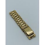 9ct gold watch strap by Britton & Sons.