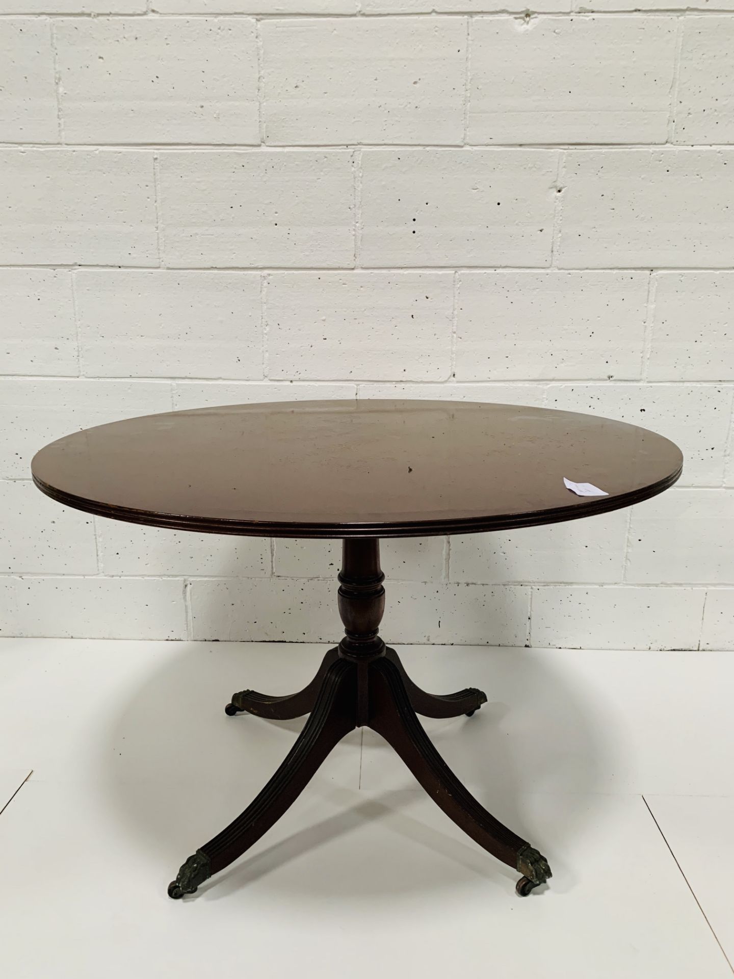 Mahogany circular pedestal table.