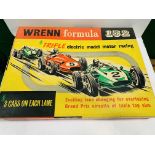 A Wrenn Formula 152 electric motor racing toy in original box.