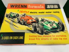 A Wrenn Formula 152 electric motor racing toy in original box.