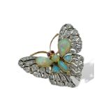 Opal, diamond and ruby butterfly brooch in original box.