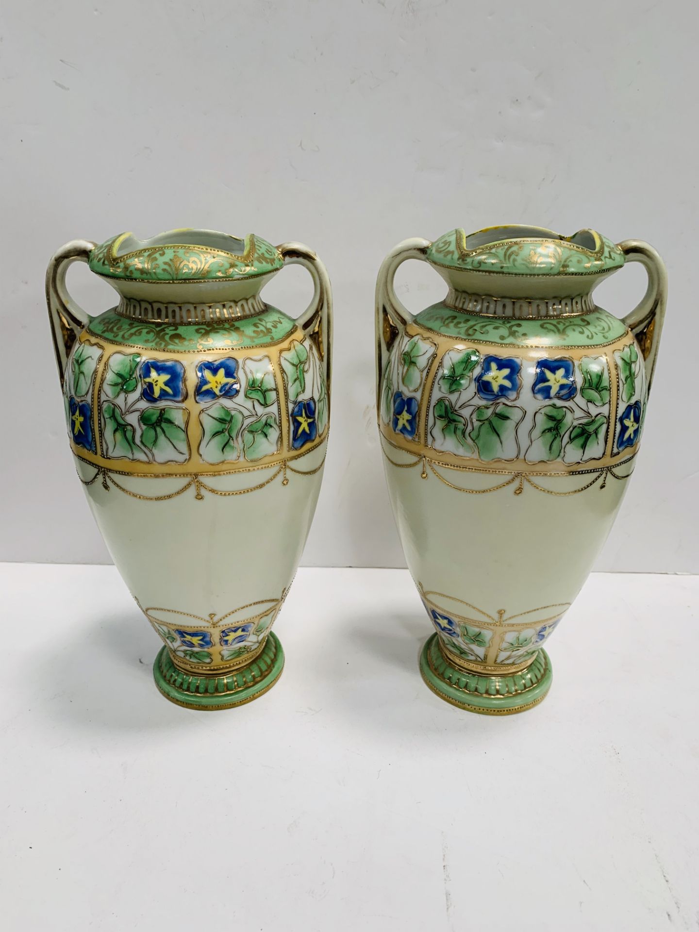 Three pairs of ceramic vases.