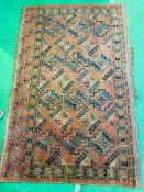 Hand knotted red ground Middle Eastern rug, 170 x 110cms.