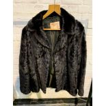 A Brahams of Reading black mink jacket and a full length black mink coat.