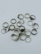 Over 20 modern sterling silver rings, various sizes.