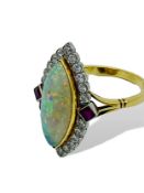 French opal, diamond and ruby ring.